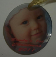 Oval Glass ornament of my nephew Brody made with sublimation printing